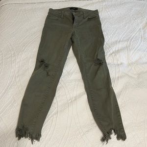 Green skinny jeans with rips size 1